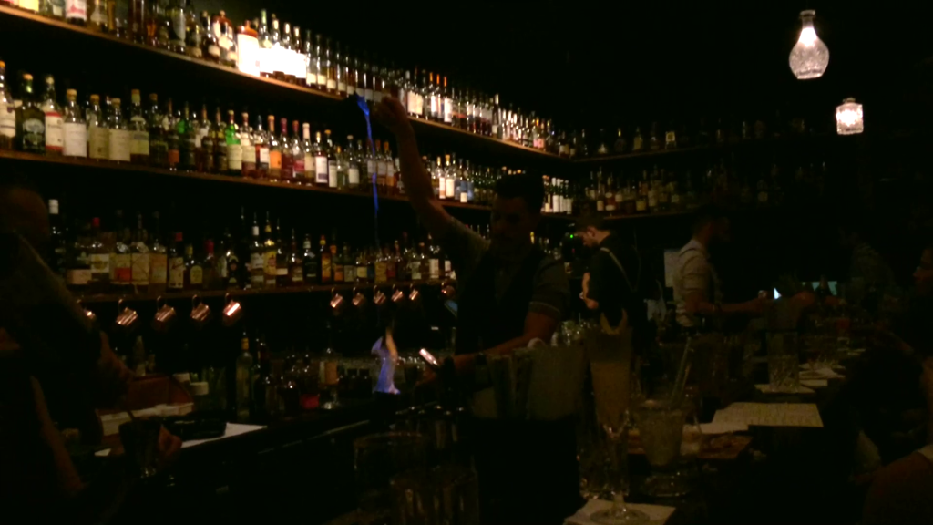 Barman makes a flaming rum drink at Eau de Vie in Melbourne March 2015.